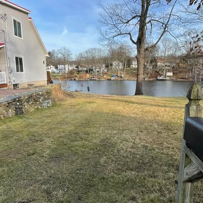 Waterfront property — tree removed beside lake, CT